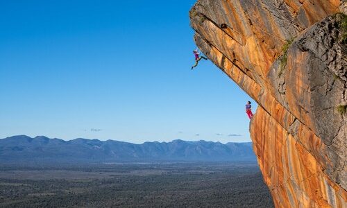 Ashlee Hendy (leading) and Elizabeth Chong (belaying) on pitch two of The Man Who Sold the World (23, 25), Clean Cuts, Grampians, Victoria, Australia.